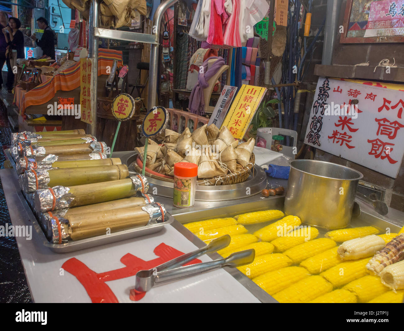 Wulai, Taiwan - October 09, 2016:  Rice Cooked in Bamboo Tubes and other local products. Bazaar in Wulai, Taiwan. Stock Photo