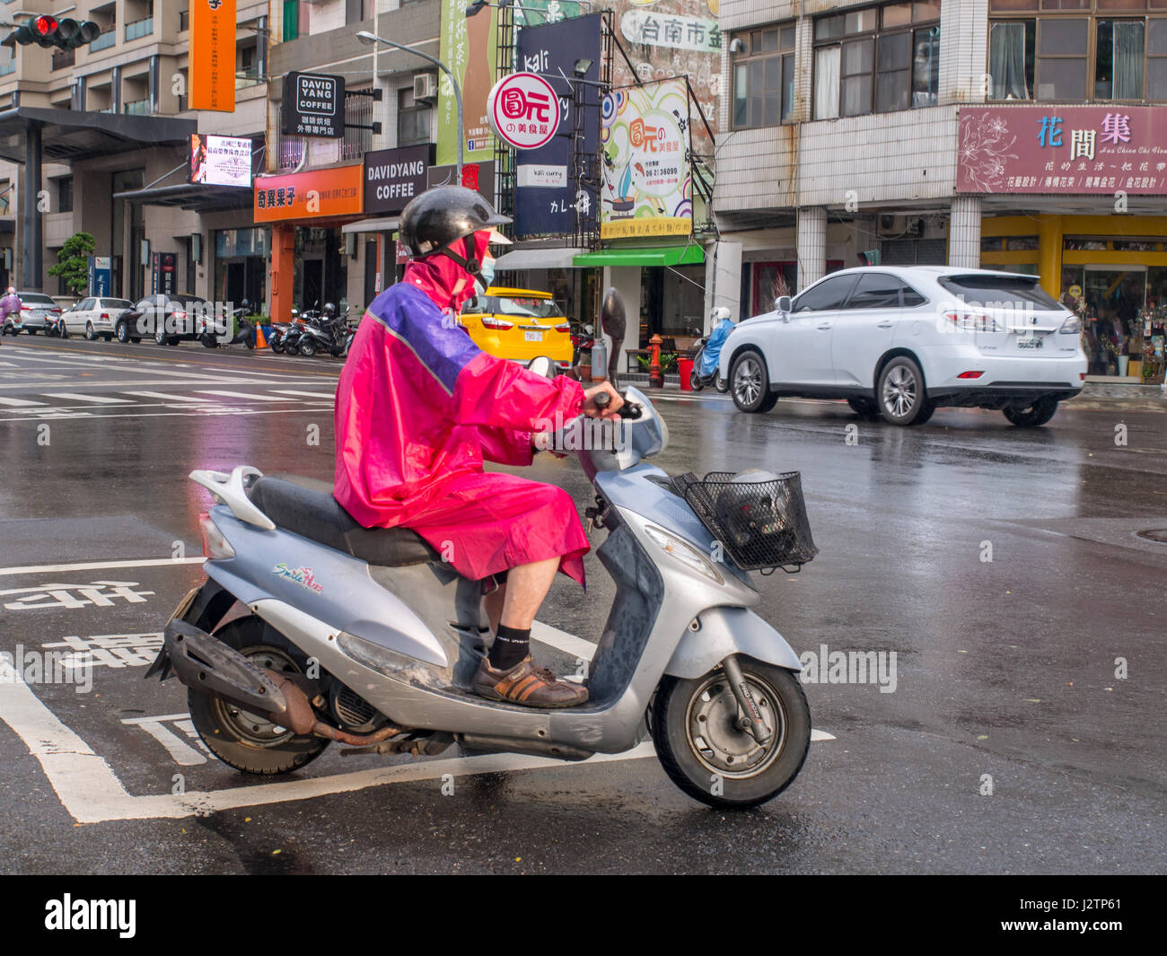 Tainan, Taiwan - October 11, 2016: The people of Taiwan on scooters Stock Photo