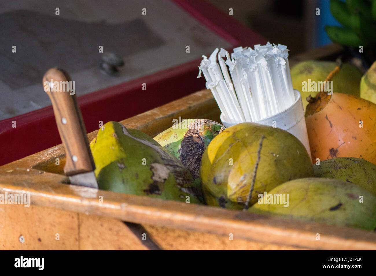 Coconuts for sale in a Mexican maket. Stock Photo