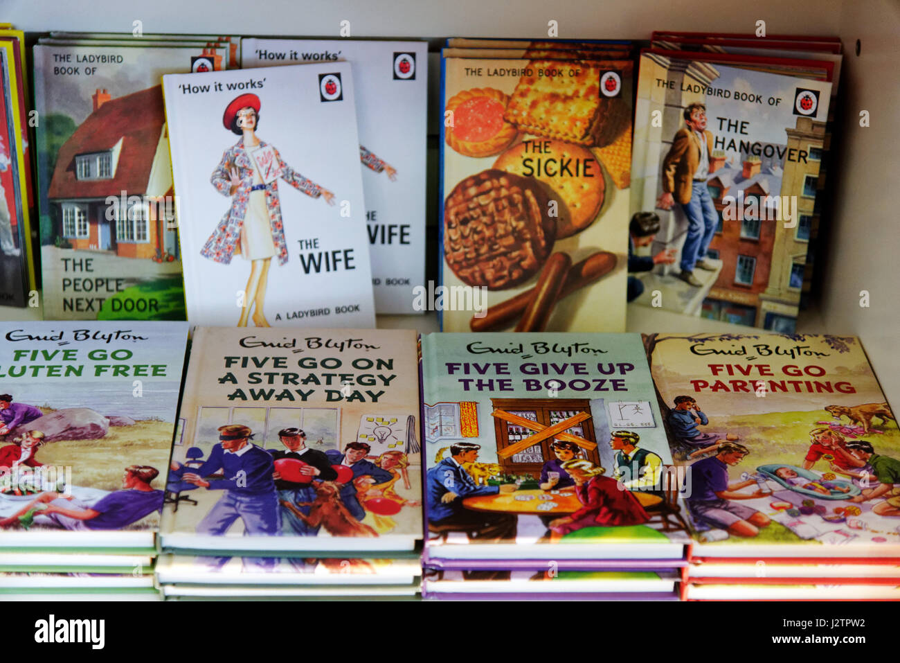 Spoof Famous Five and Ladybird Books titles, including Five Go Gluten Free and Five Go Parenting and the Ladybird book of The Hangover and The Sickie. Stock Photo