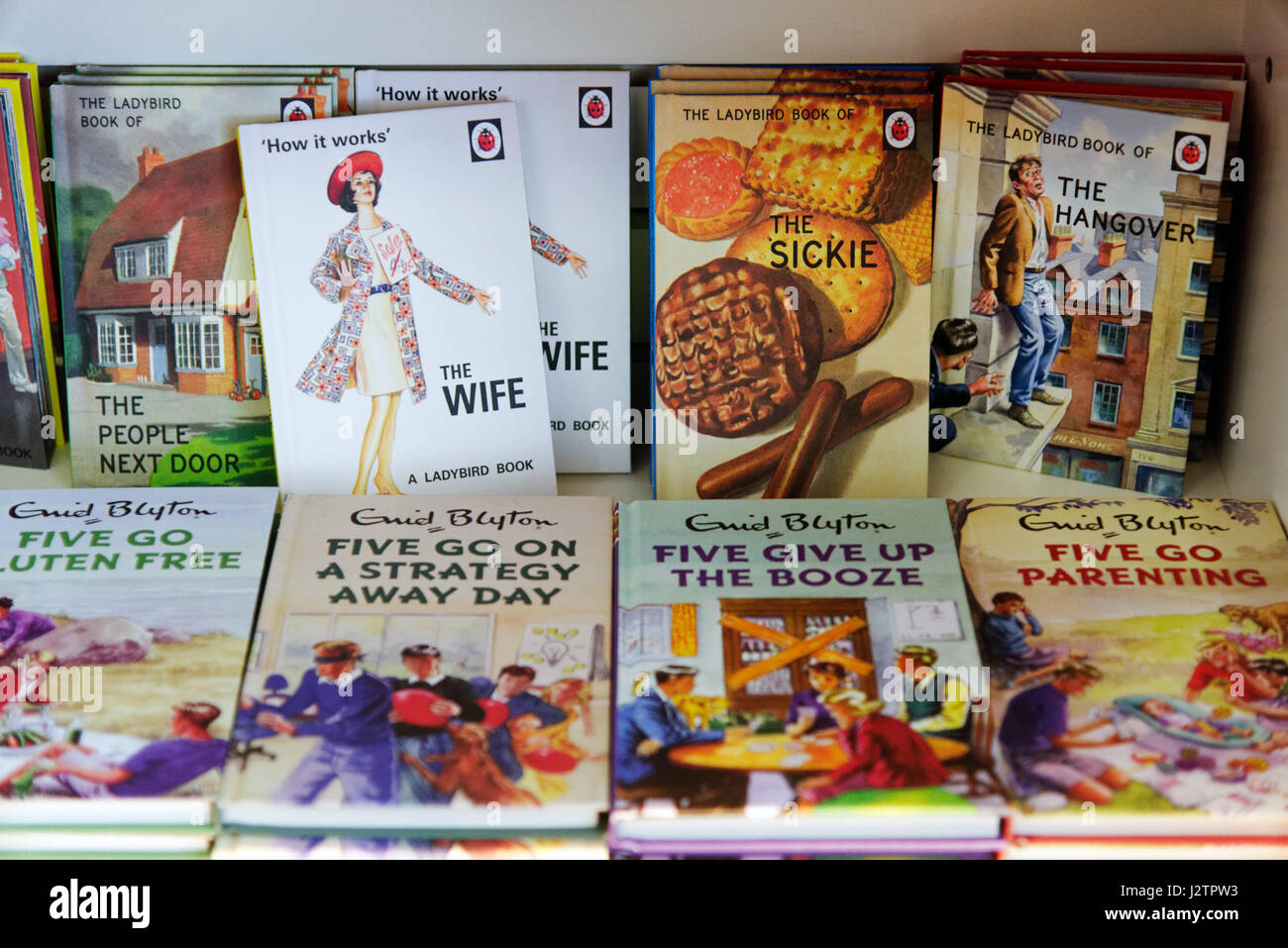 Spoof Famous Five and Ladybird Books titles, including Five Go Gluten Free and Five Go Parenting and the Ladybird book of The Hangover and The Sickie. Stock Photo