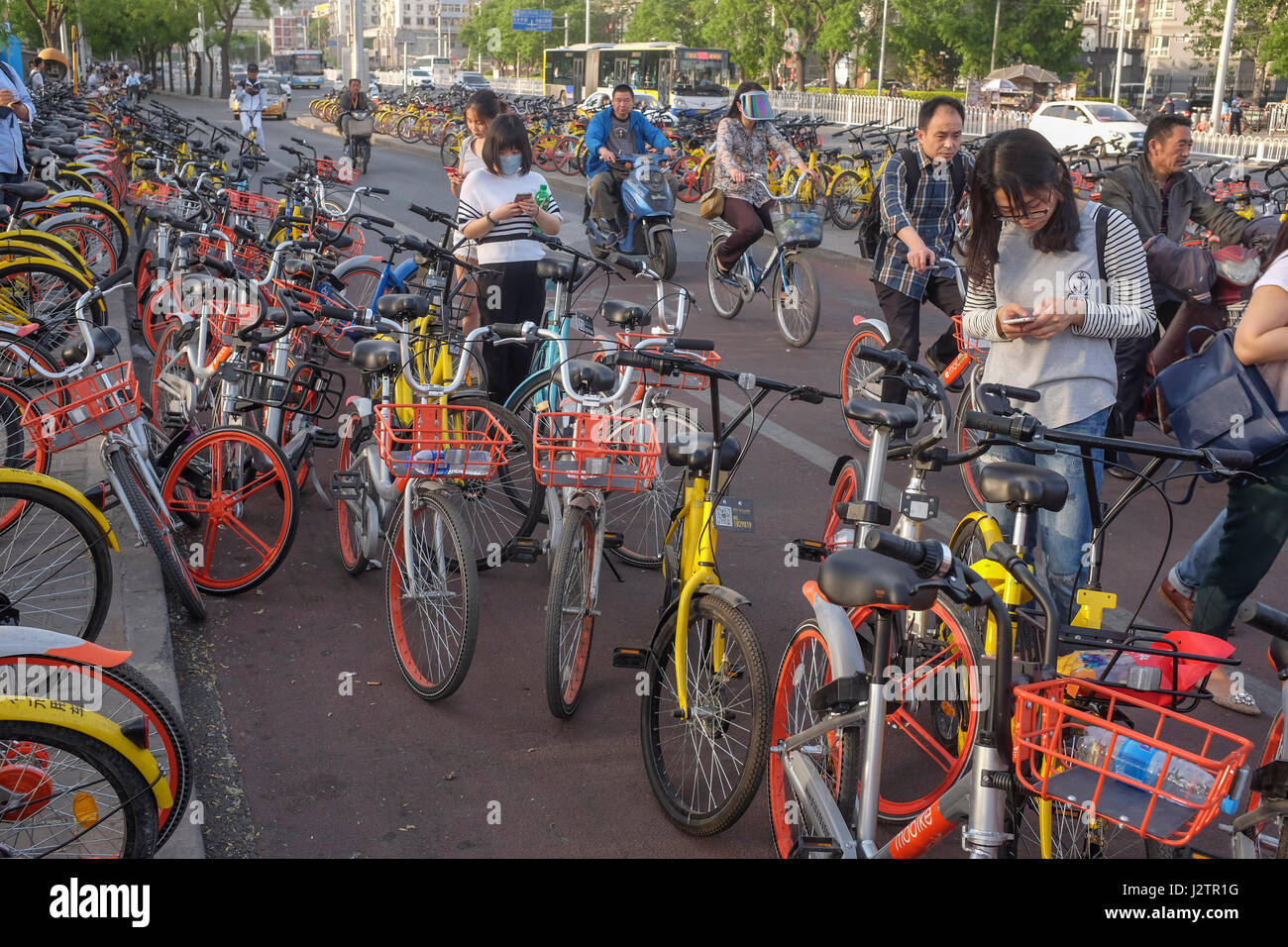 People use sharing-bikes in Beijing, China. 29-Apr-2017 Stock Photo