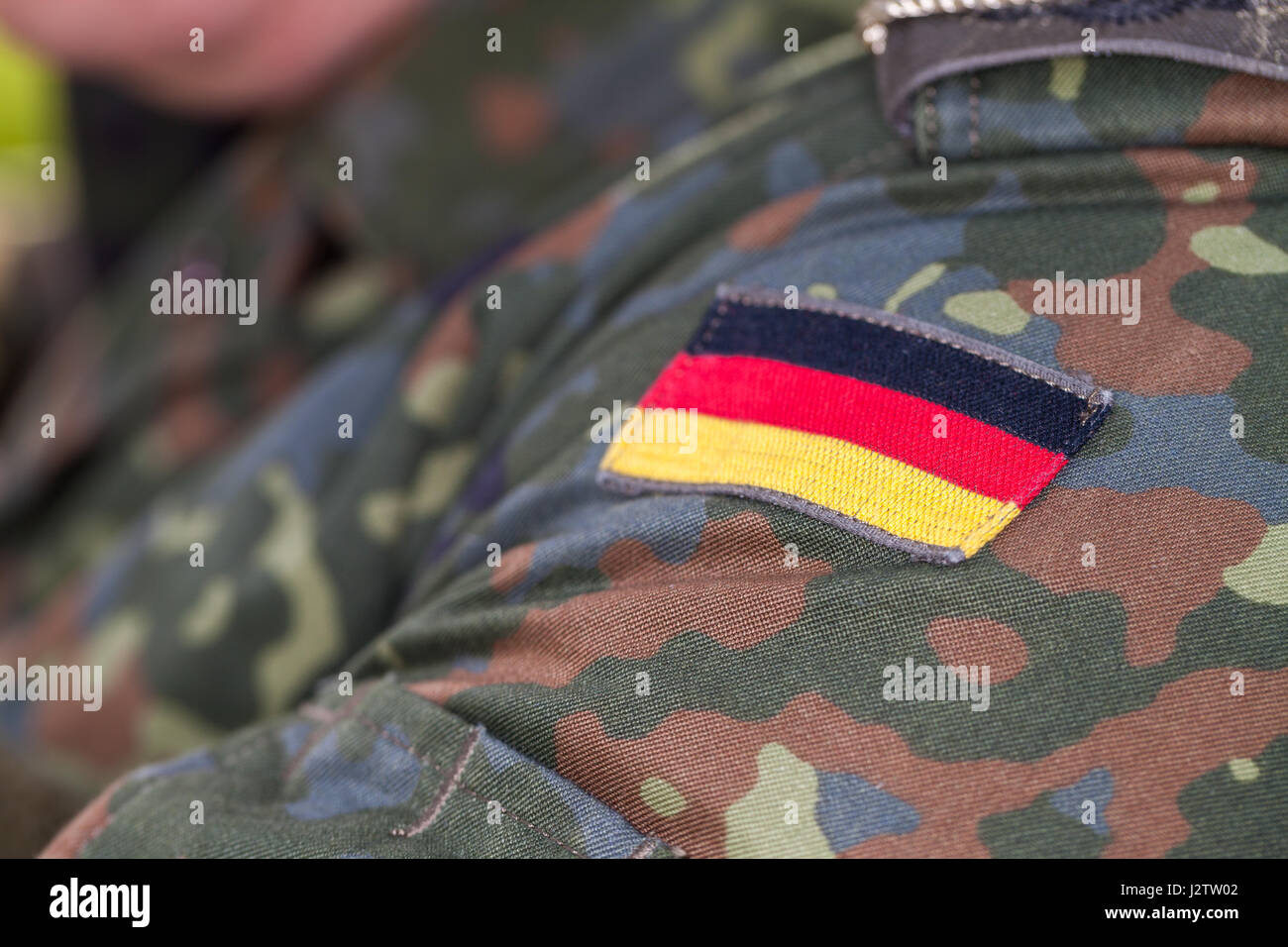 german flag on german army uniform Stock Photo