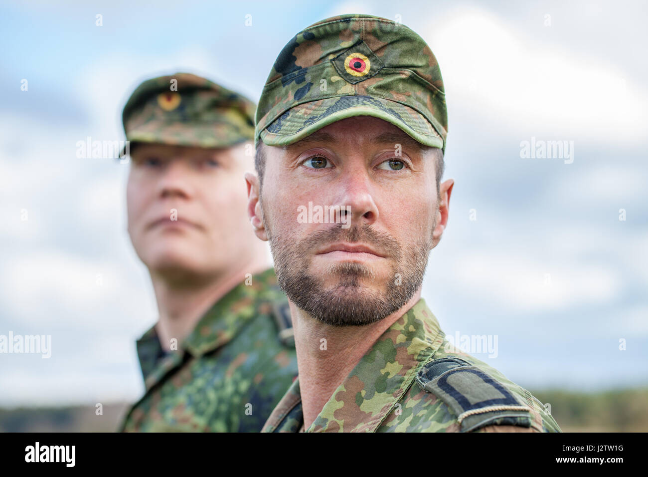 two german soldiers looks to the side Stock Photo