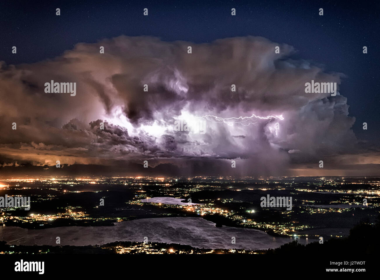 Storm clouds over the Province of Varese seen from the mountain Campo dei Fiori, Lombardy - Italy Stock Photo