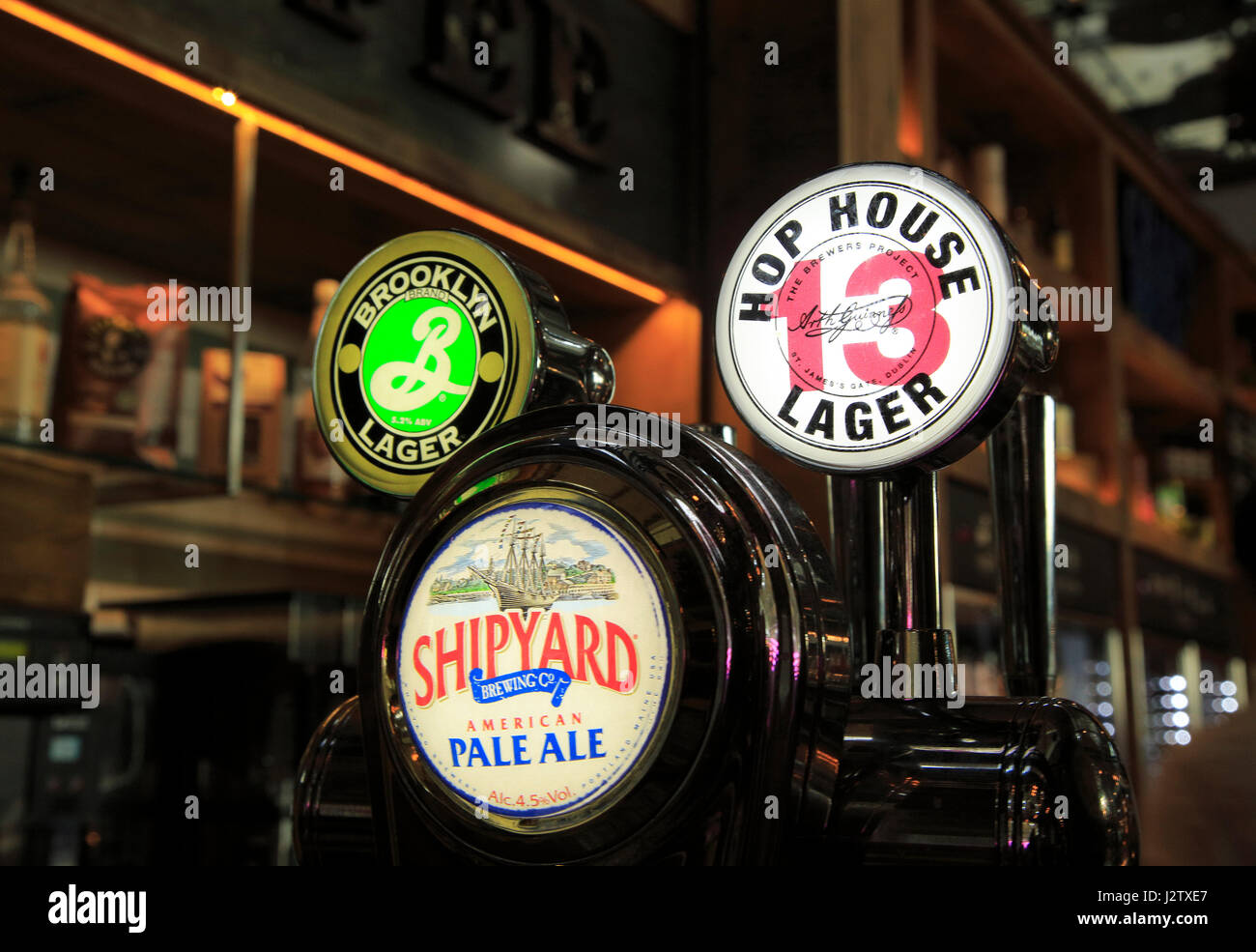 Bar beer signs different beers at Wetherspoons bar, Stansted airport