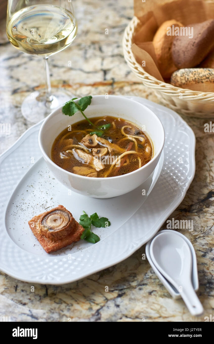 Mushroom soup with egg noodles Stock Photo Alamy