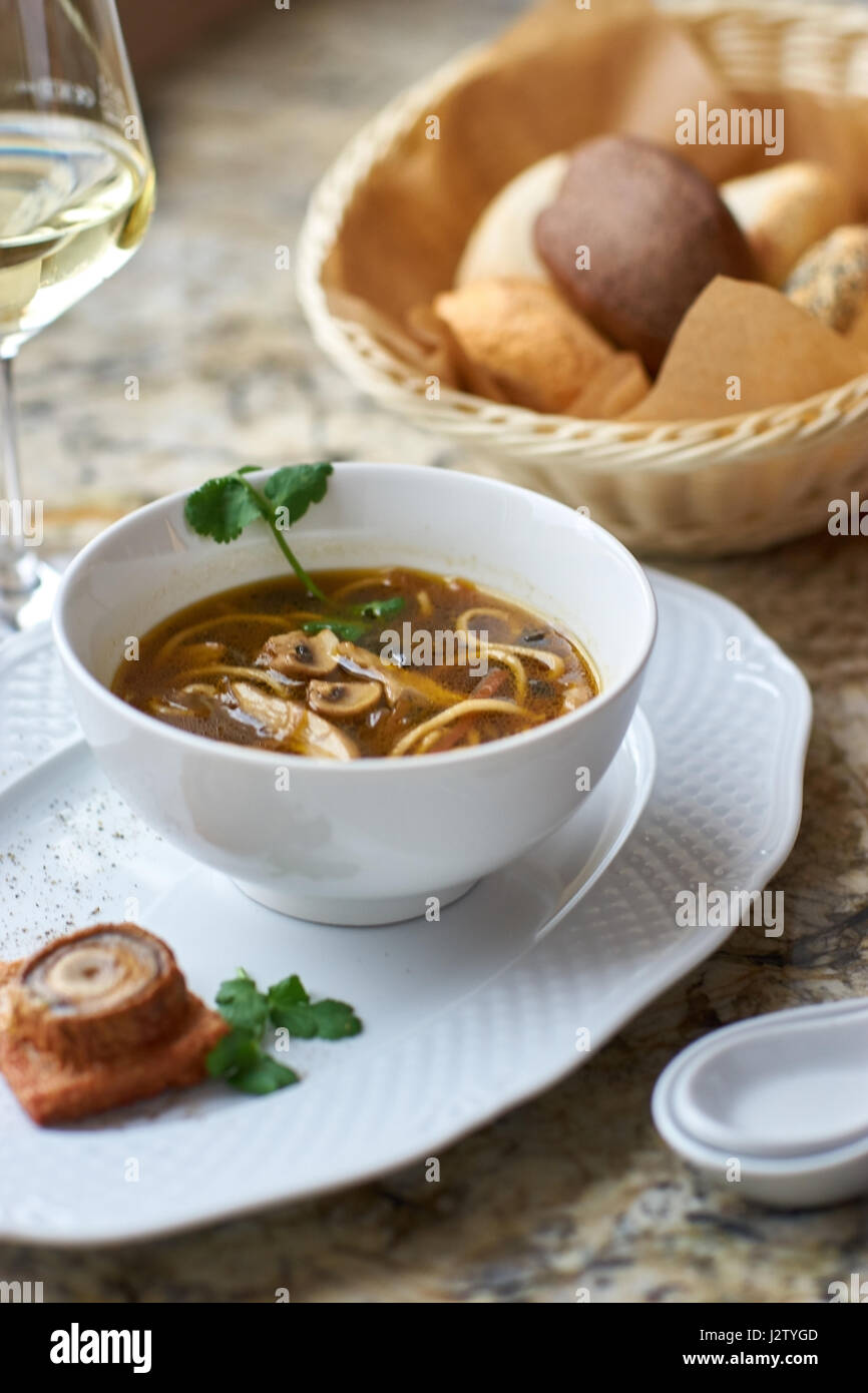 Mushroom soup with egg noodles Stock Photo Alamy
