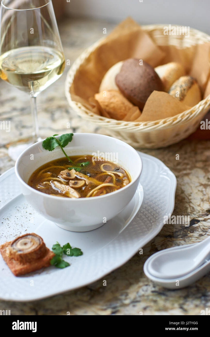 Mushroom soup with egg noodles Stock Photo - Alamy