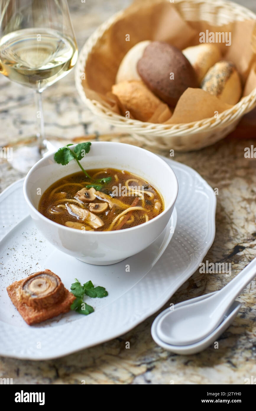 Mushroom soup with egg noodles Stock Photo Alamy