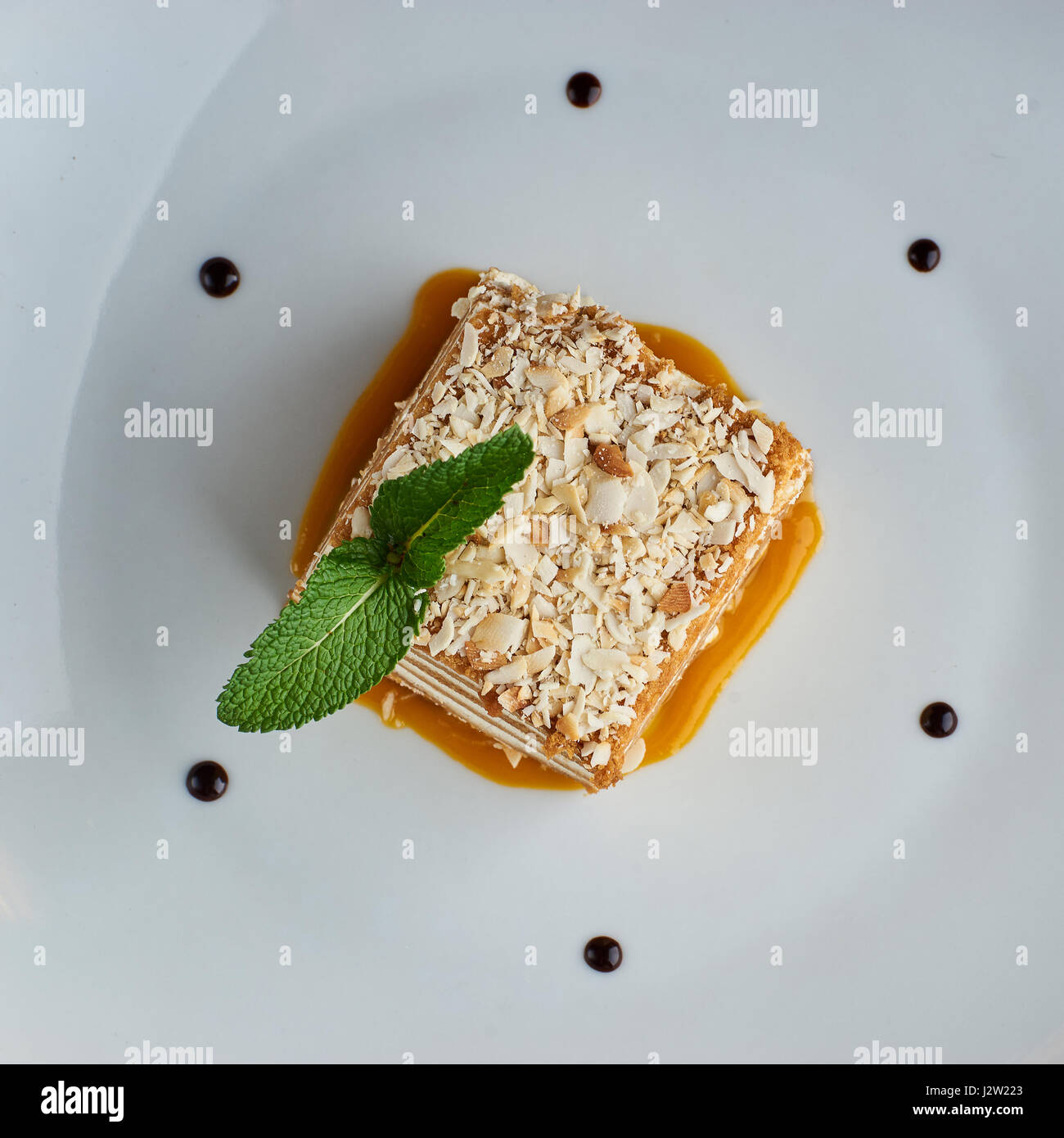 Slice of layered honey cake Stock Photo