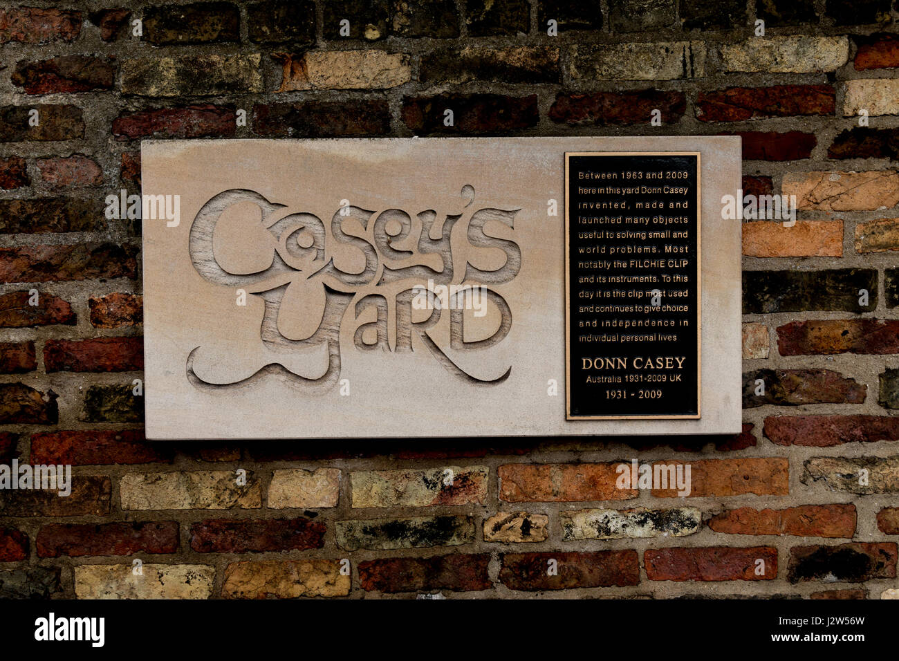 Casey's Yard stone sign, inventor of the flilche clip.  Newmarket Road, Cambridge Stock Photo