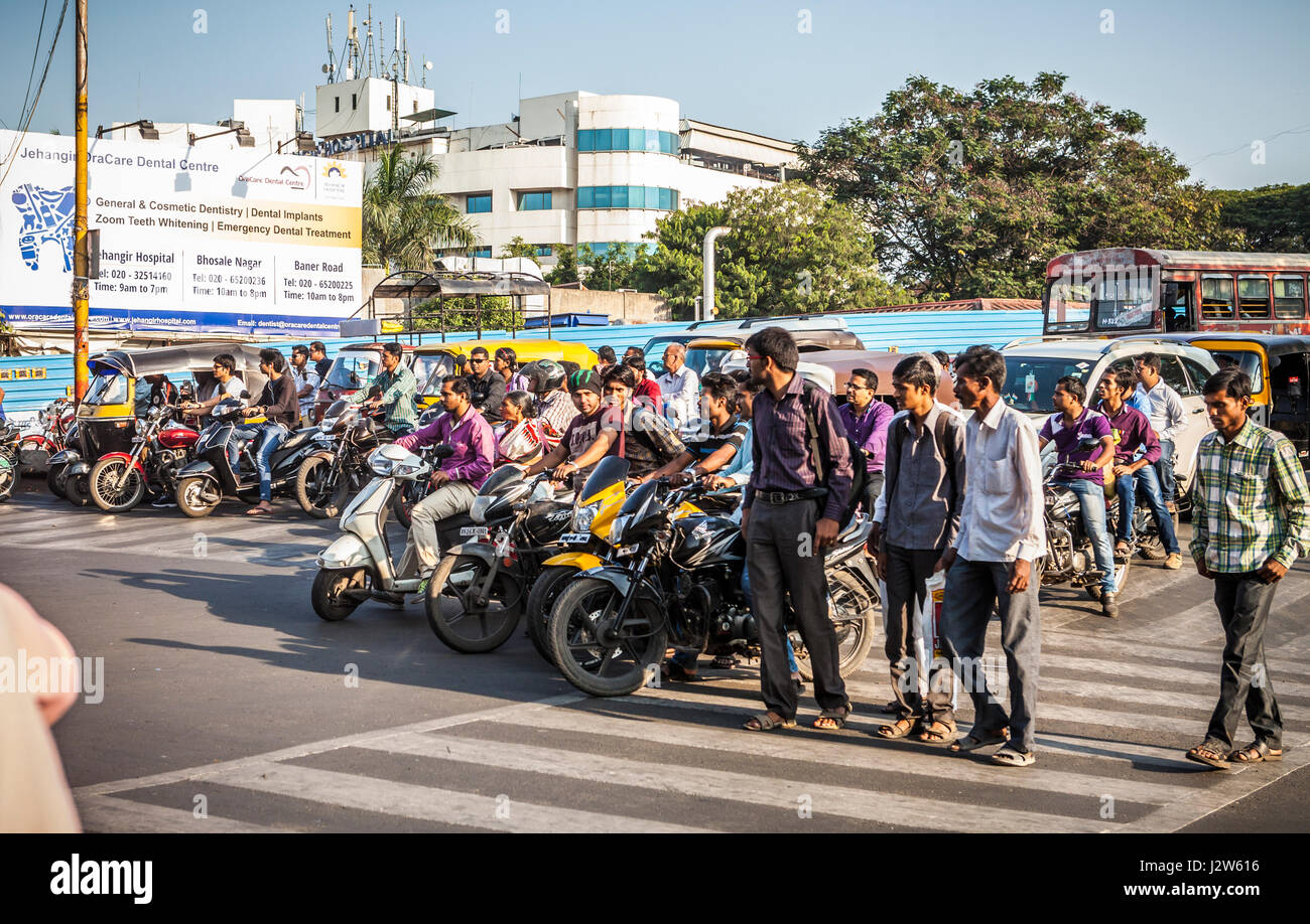 A view of traffic in Pune, India through a car's windshiled. Stock Photo