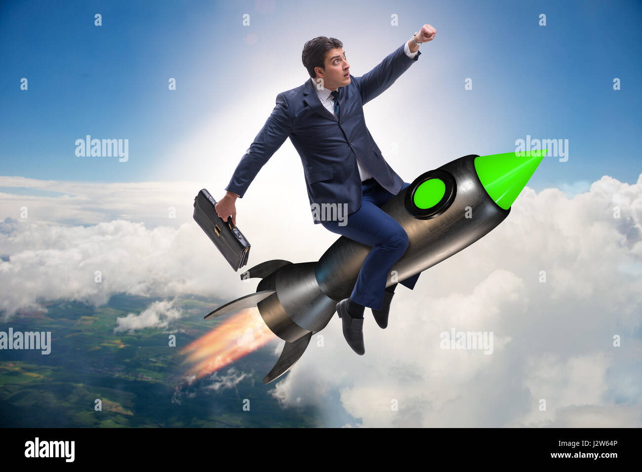 Male businessman flying on rocket in business concept Stock Photo - Alamy