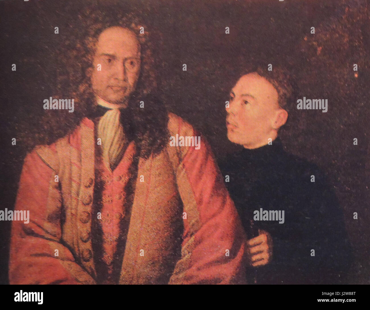 The image portrays A.N. Lenin with a Kalmik boy, possibly reflecting ...
