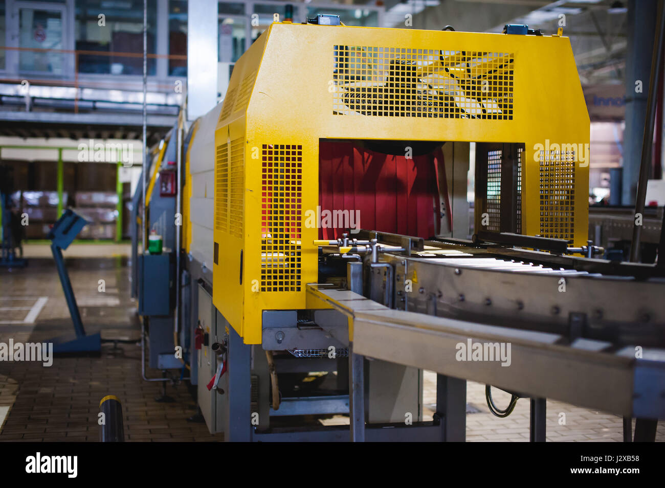 Beer production line. Equipment for the staged production and bottling of the finished product. Special industrial technological device at the factory Stock Photo