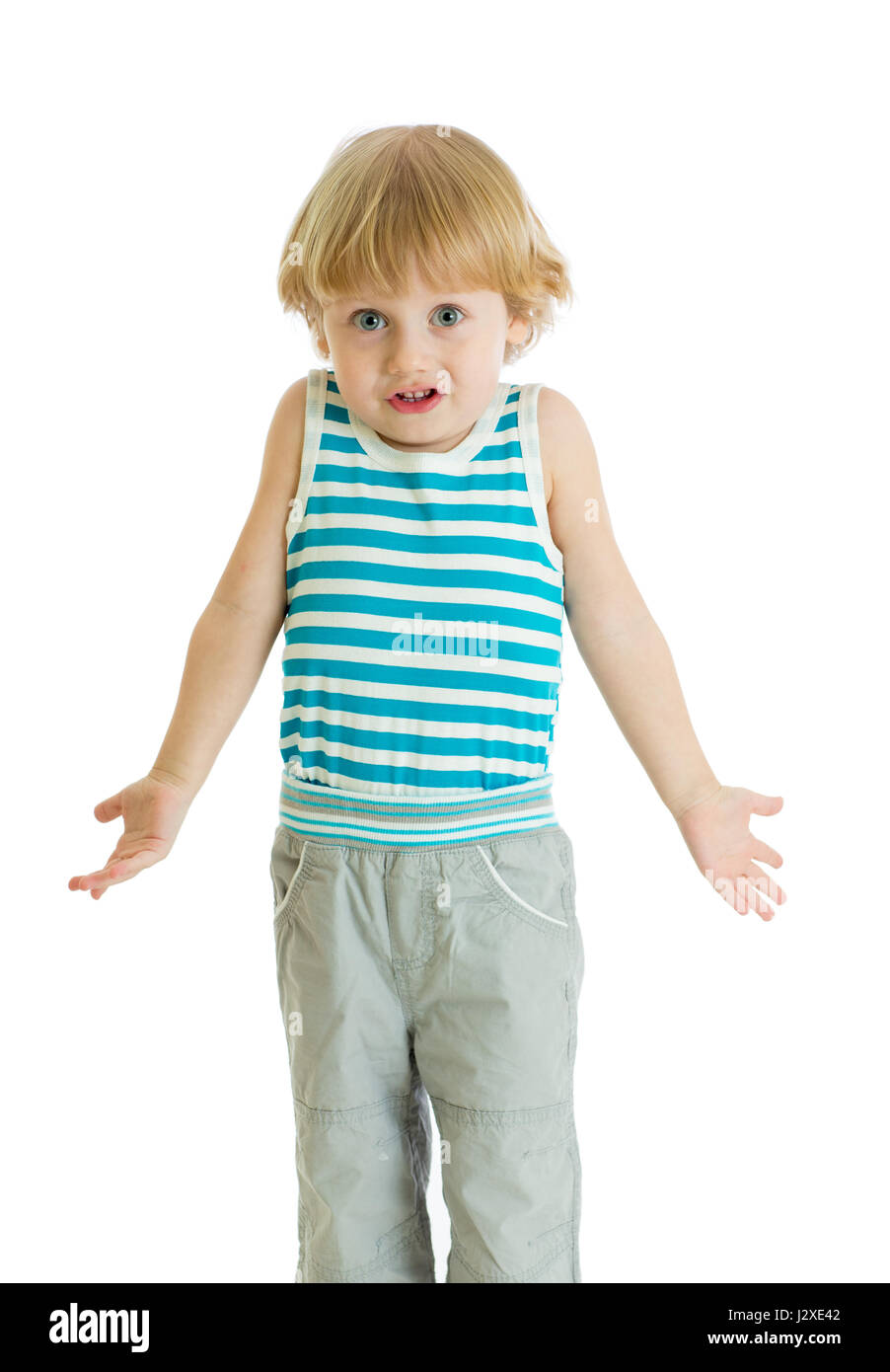 Shrugging child. Kid boy looks puzzled, isolated Stock Photo