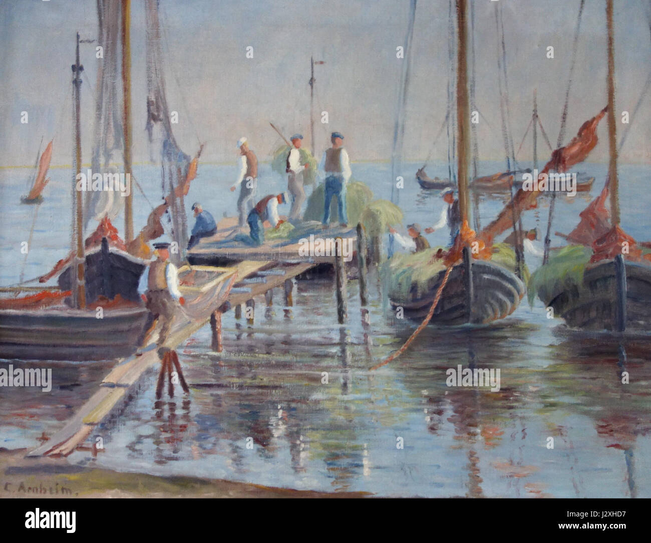 The image depicts the old fishing harbor in Vitte, located on the island of Hiddensee in Germany. The harbor represents the island's historical connection to the fishing industry and its maritime heritage. Stock Photo