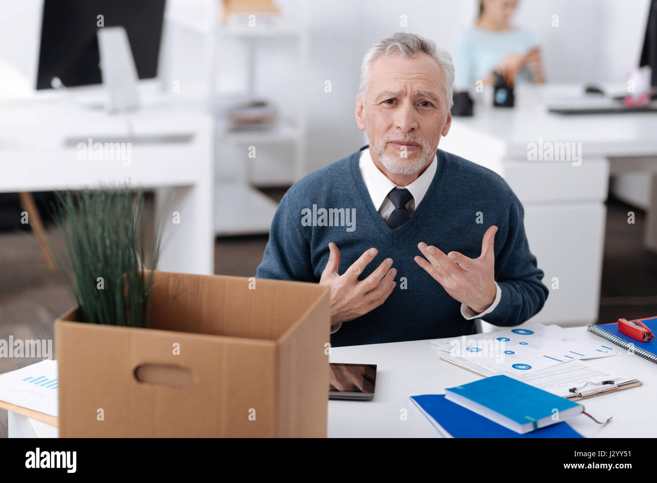 Exhausted male person rising his hands Stock Photo