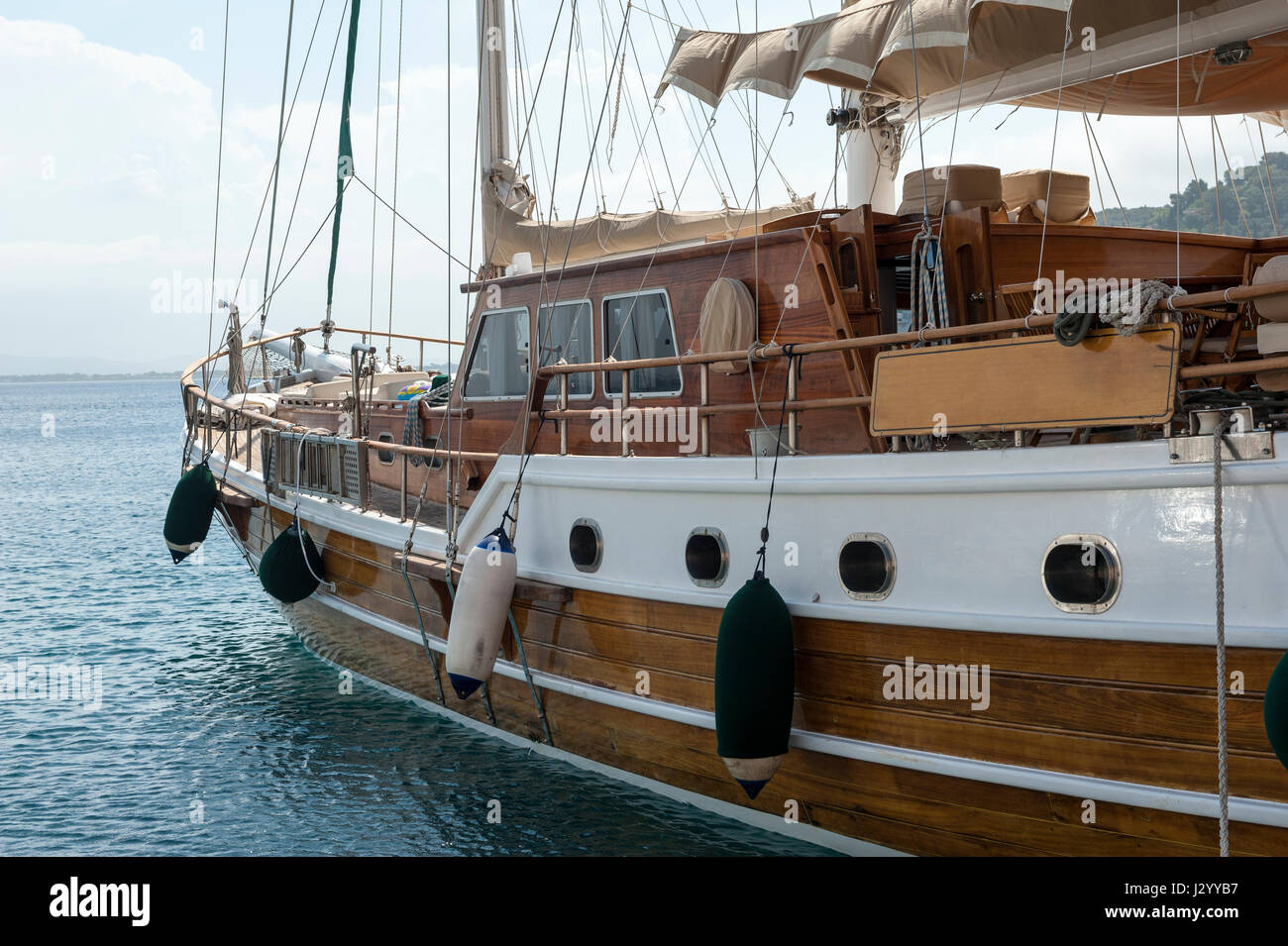 Old historical wooden ship in blue sea Stock Photo - Alamy