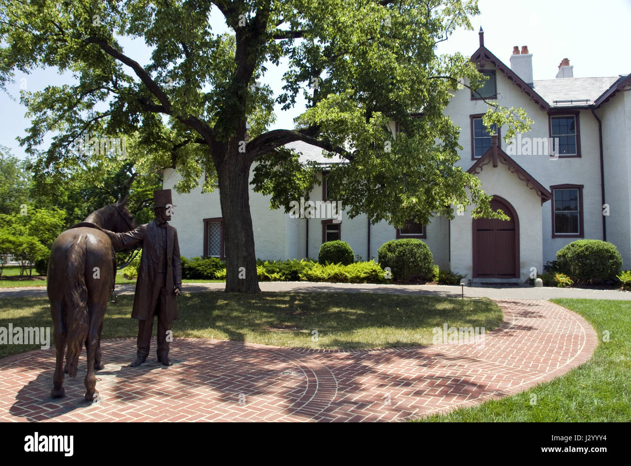 A bronze statue of President Lincoln at Lincoln's Cottage, a national monument at the former "Soldiers' Home," Washington, DC. Stock Photo