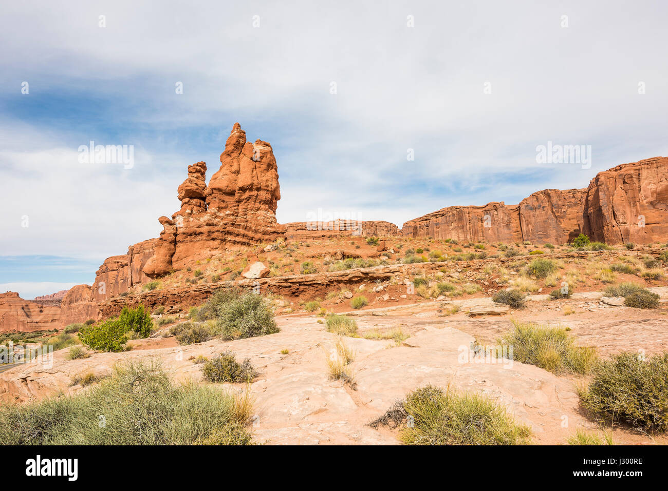 Tall red balancing rocks in Arches National Park in canyons Stock Photo ...