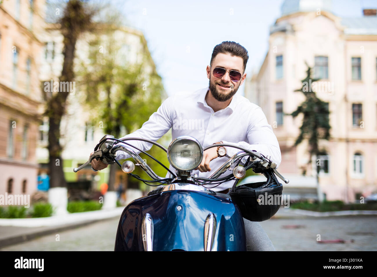 Old man wearing helmet riding hi-res stock photography and images - Alamy