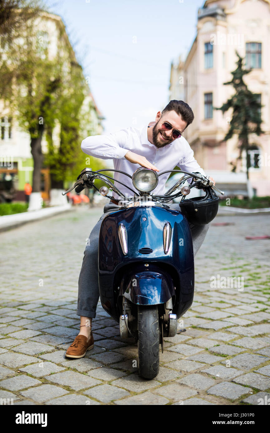Old man wearing helmet riding hi-res stock photography and images - Alamy