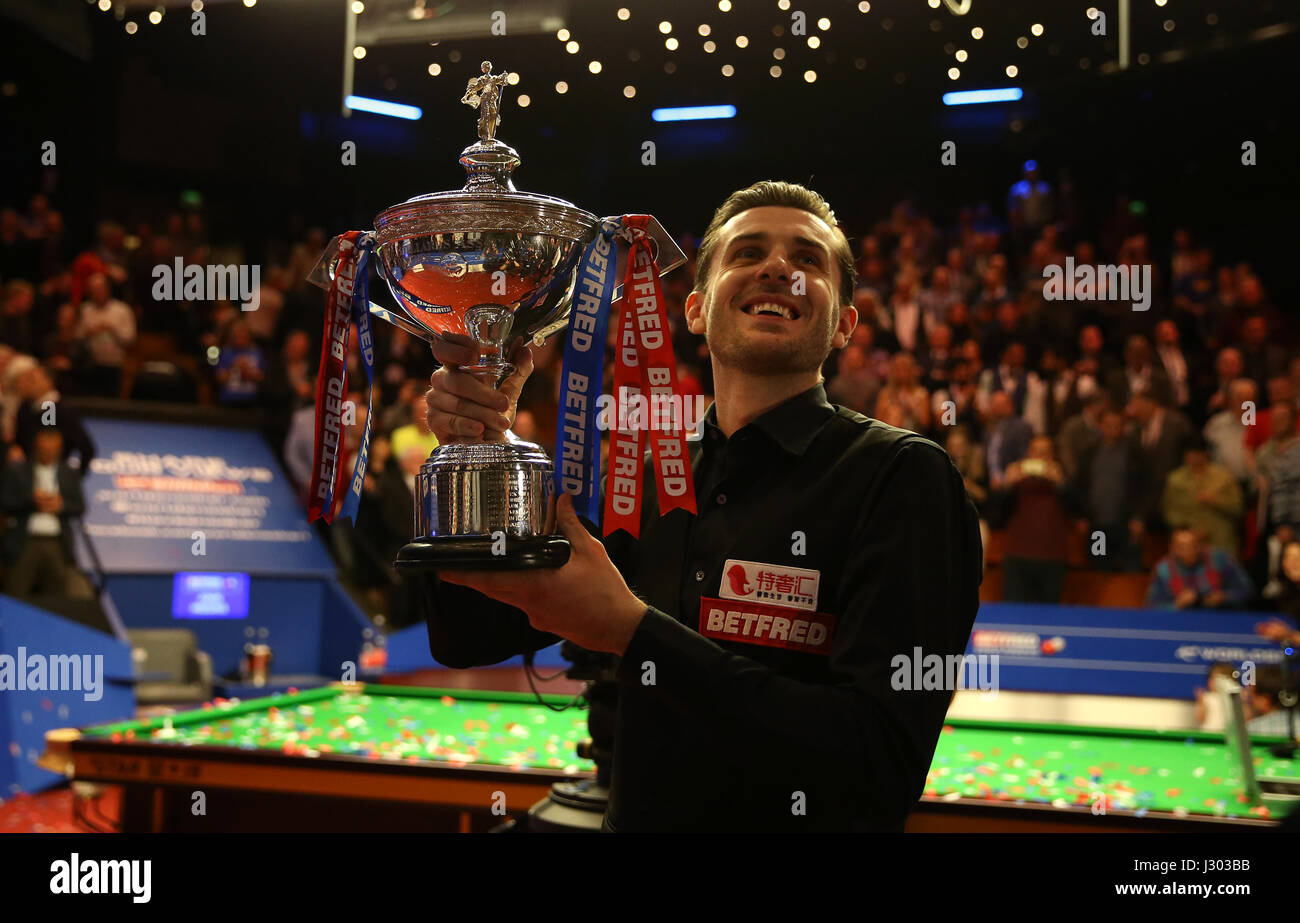 Mark Selby celebrates winning the Betfred Snooker World Championship with his daughter Sofia Maria and wife Vikki Layton on day seventeen of the Betfred Snooker World Championships at the Crucible Theatre, Sheffield