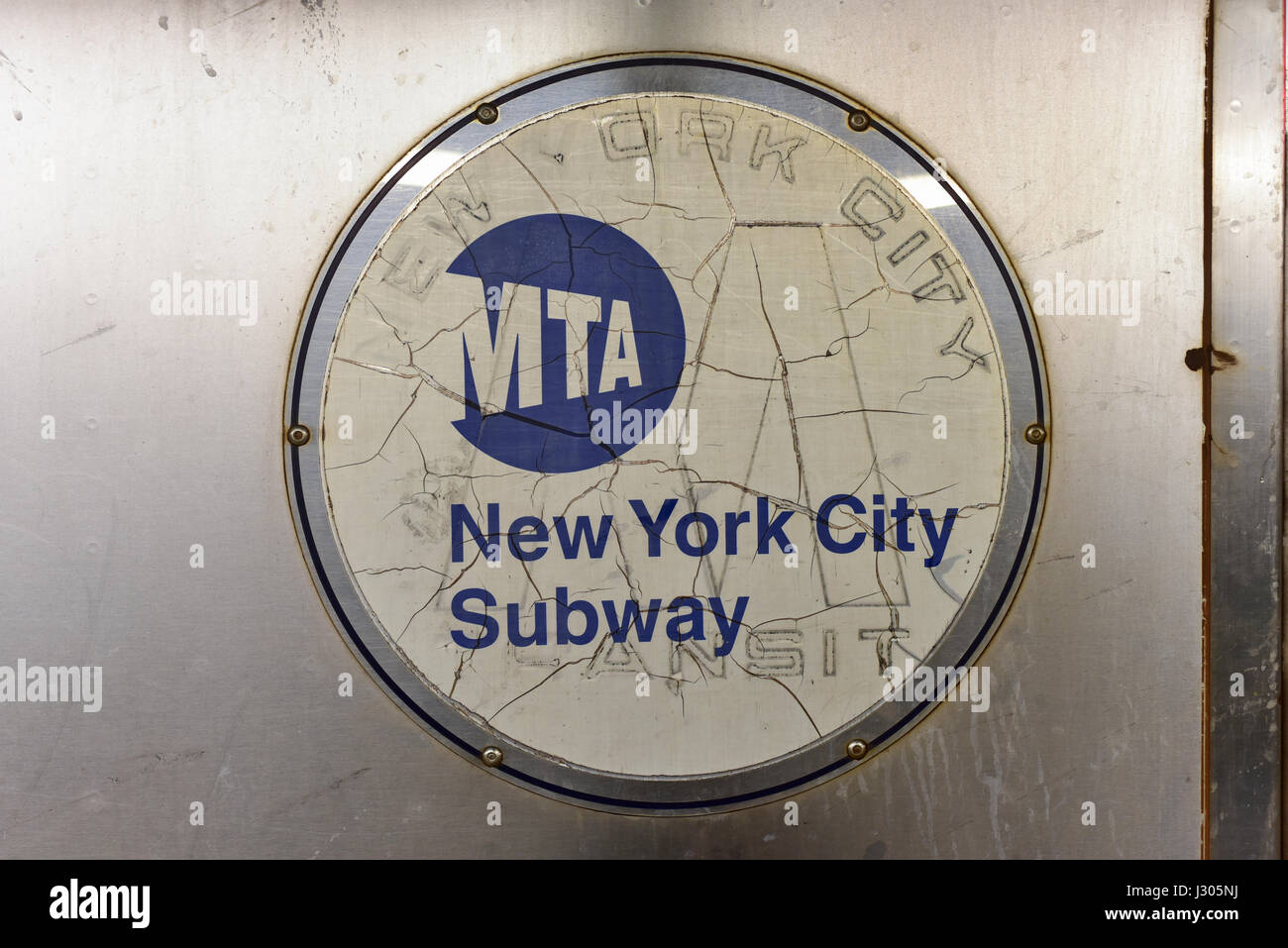 Brooklyn, New York - March 24, 2017: MTA New York City subway logo on the exterior of a train car. Stock Photo