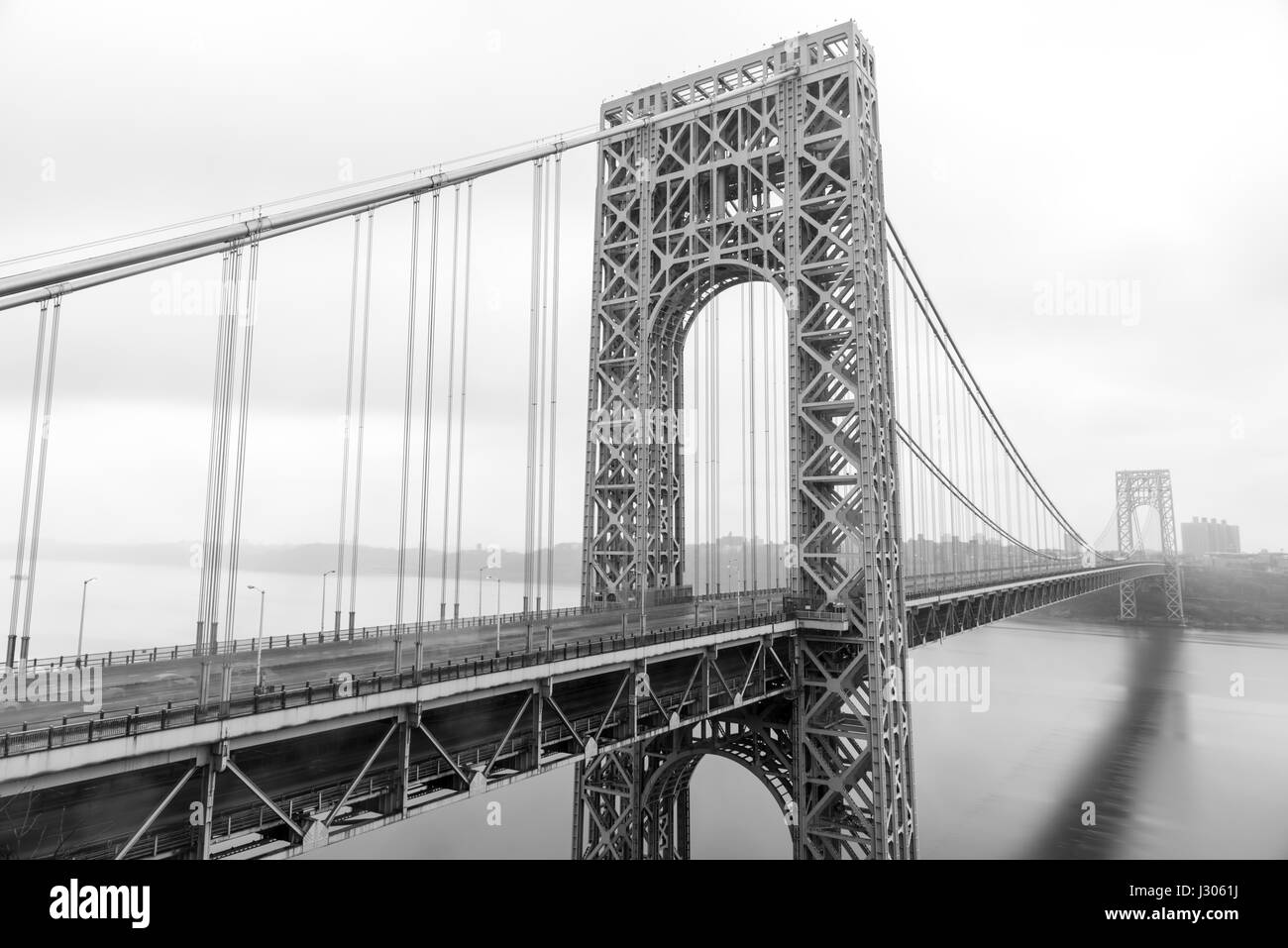 George Washington Bridge crossing the Hudson River on a overcast cloudy day from Fort Lee, New Jersey. Stock Photo