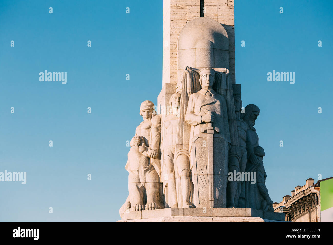 Riga, Latvia. Close Up Detail Of Famous Landmark - Memorial Freedom Monument At Freedom Square In Sunny Summer Day. Stock Photo
