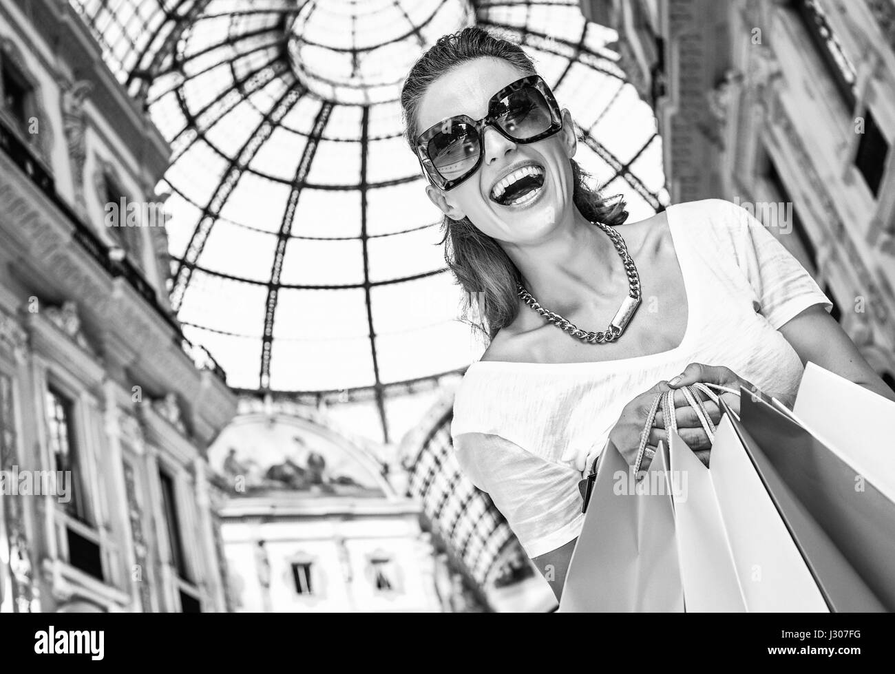 Discover most unexpected trends in Milan. smiling fashion monger in