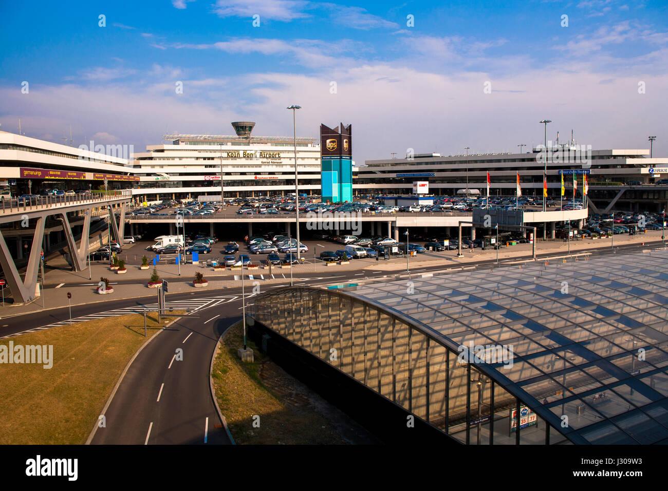 Germany, Cologne, terminal 1 of the Airport Cologne-Bonn, on the right the airport railway station. Stock Photo
