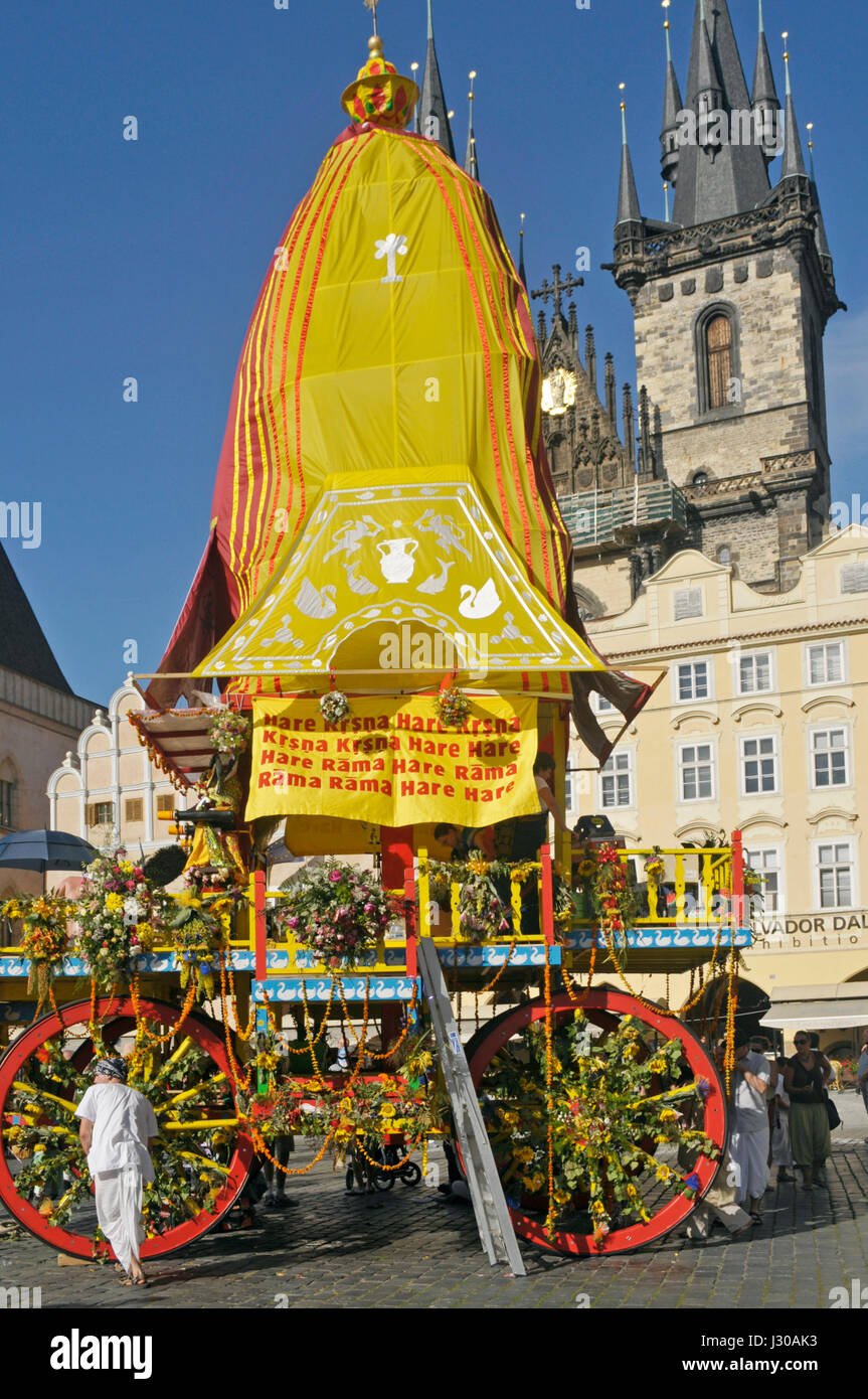 Hare Krishna cart (ratha) and The Church of Our Lady Before Tyn in Prague, Czech Republic Stock Photo
