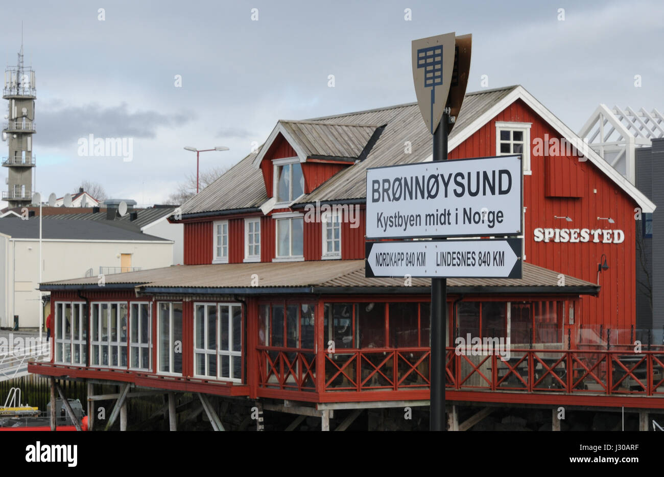 Sign saying that  Bronnoysund is in the middle of Norway ‘Kystbyen midt i Norge’, The coastal city in the middle of Norway Stock Photo