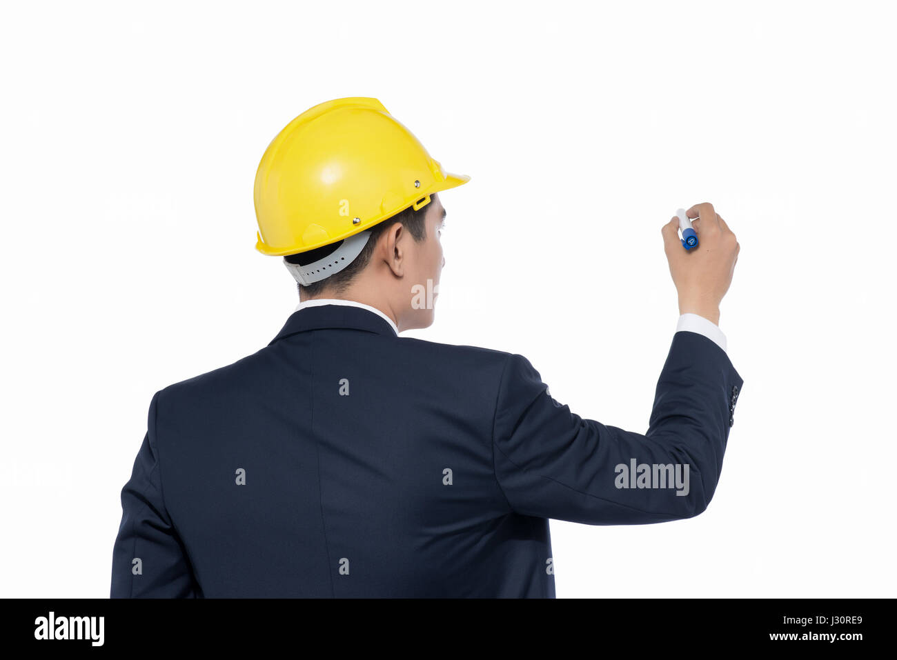 Asian architect engineer manager looking and writing by marker Stock Photo