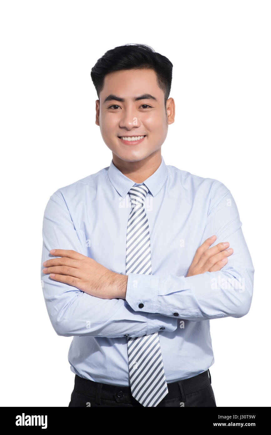 Handsome asian businessman crossed arms on white Stock Photo - Alamy