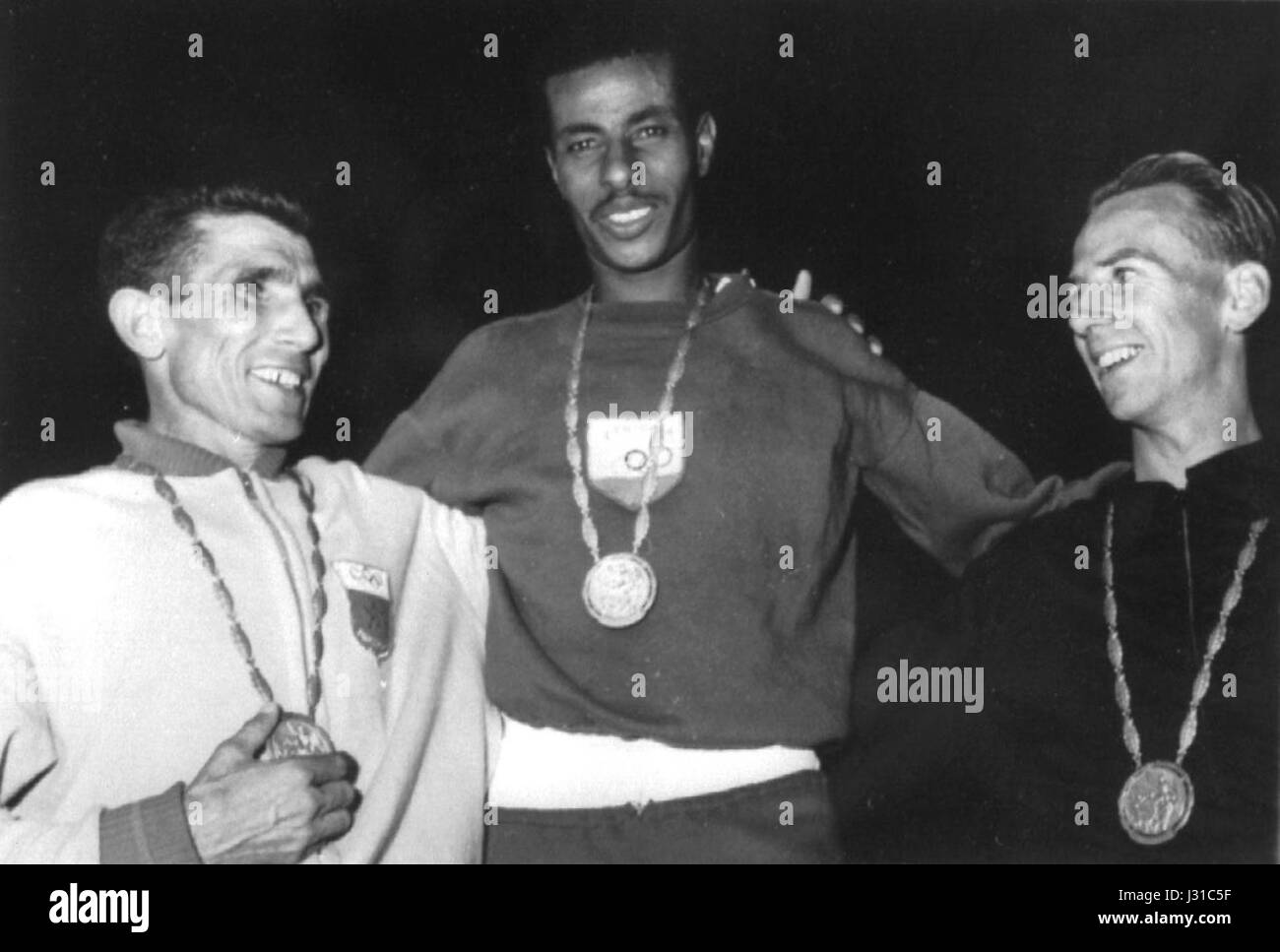 Rhadi Ben Abdesselam, Abebe Bikila, Barry Magee 1960 Stock Photo