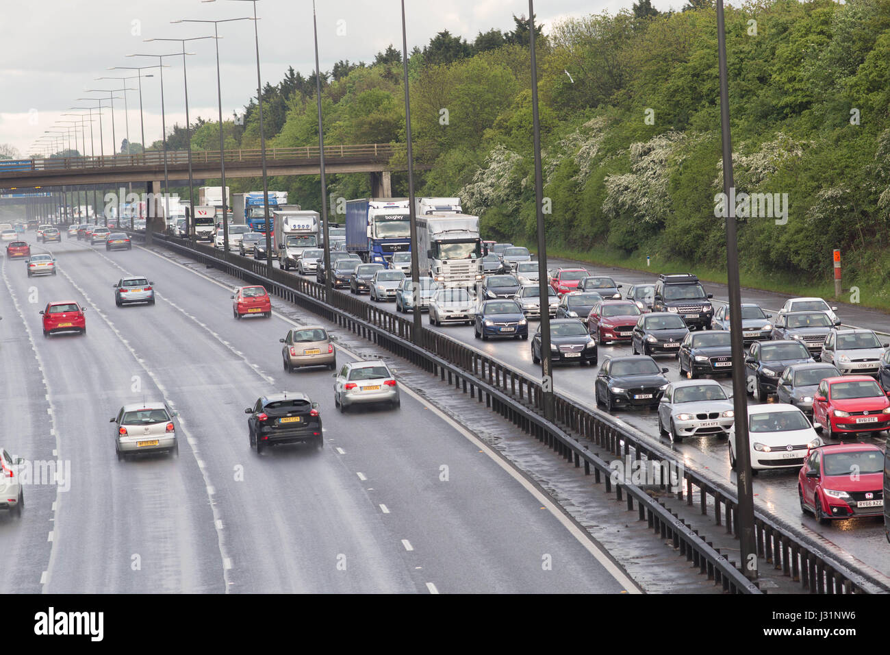 M0 Accident Near High Wycombe Bucks, UK. 1st May, 2017. A BMW car upturn on it roof just before junction 3 of the M40 (Loudwater turning) the car was head was going towards Oxford the queuing traffic trying to pass the accident Credit: Brian Southam/Alamy Live News Stock Photo