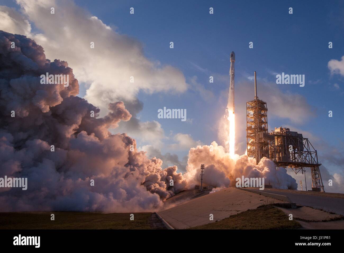 Cape Canaveral, United States Of America. 01st May, 2017. The SpaceX Falcon 9 rocket carrying a classified military satellite successfully blasts off from Launch Complex 39A at the Kennedy Space Center May 1, 2017 in Cape Canaveral, Florida. The the delayed SpaceX mission was the first for the National Reconnaissance Office carrying a top-secret spy satellite. Stock Photo
