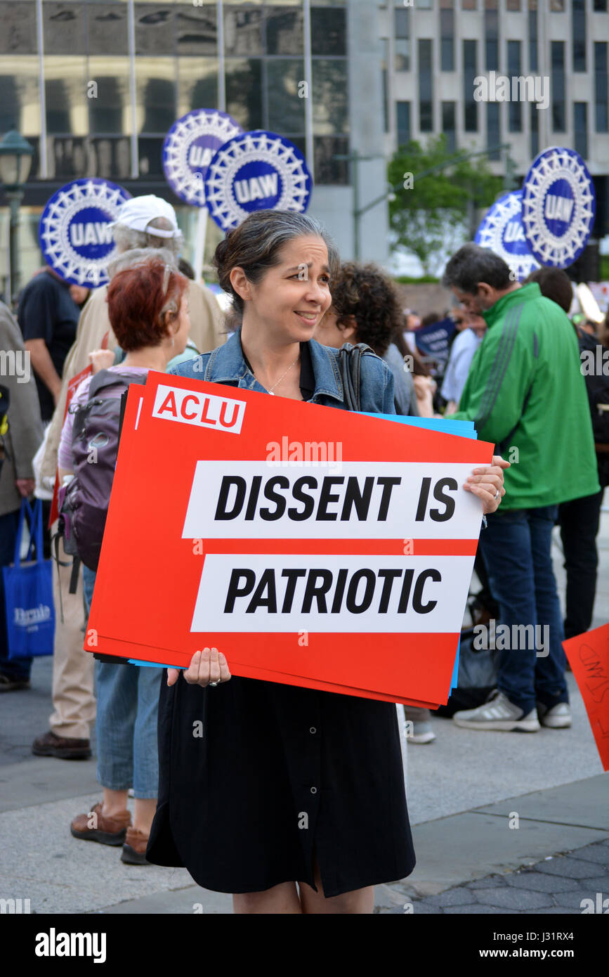 New York, USA. 1st May, 2017. People holding signs at a May Day rally in New York City. Credit: Christopher Penler/Alamy Live News Stock Photo