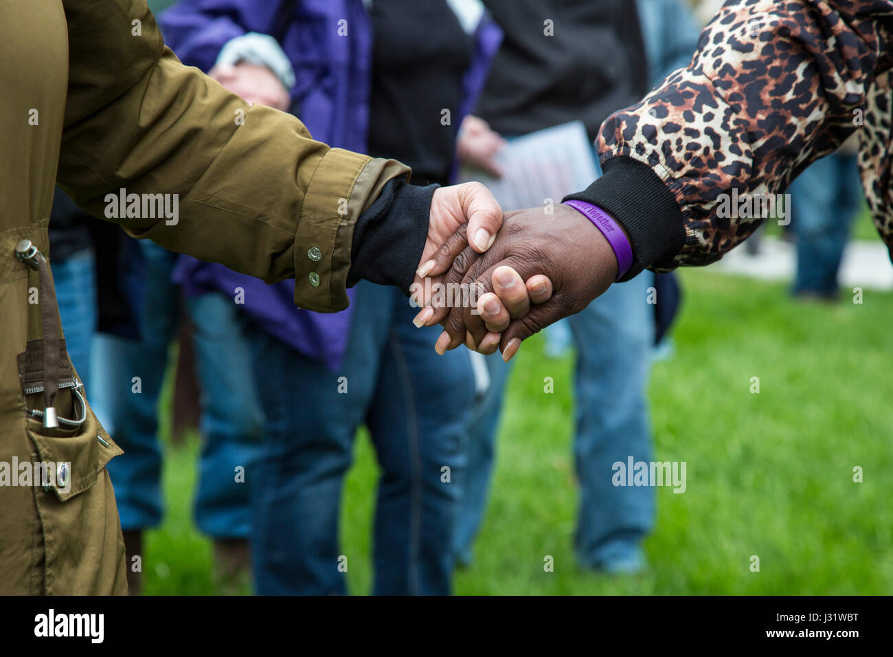 Detroit, Michigan, USA. 1st May, 2017. Hundreds joined hands in prayer during a Rally for Immigrant Families. Credit: Jim West/Alamy Live News Stock Photo