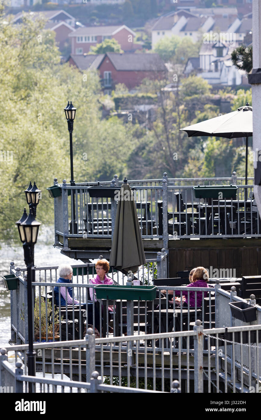 People enjoyng the view on the River Dee during warm and pleasant weather in Llangollen, North Wales Stock Photo