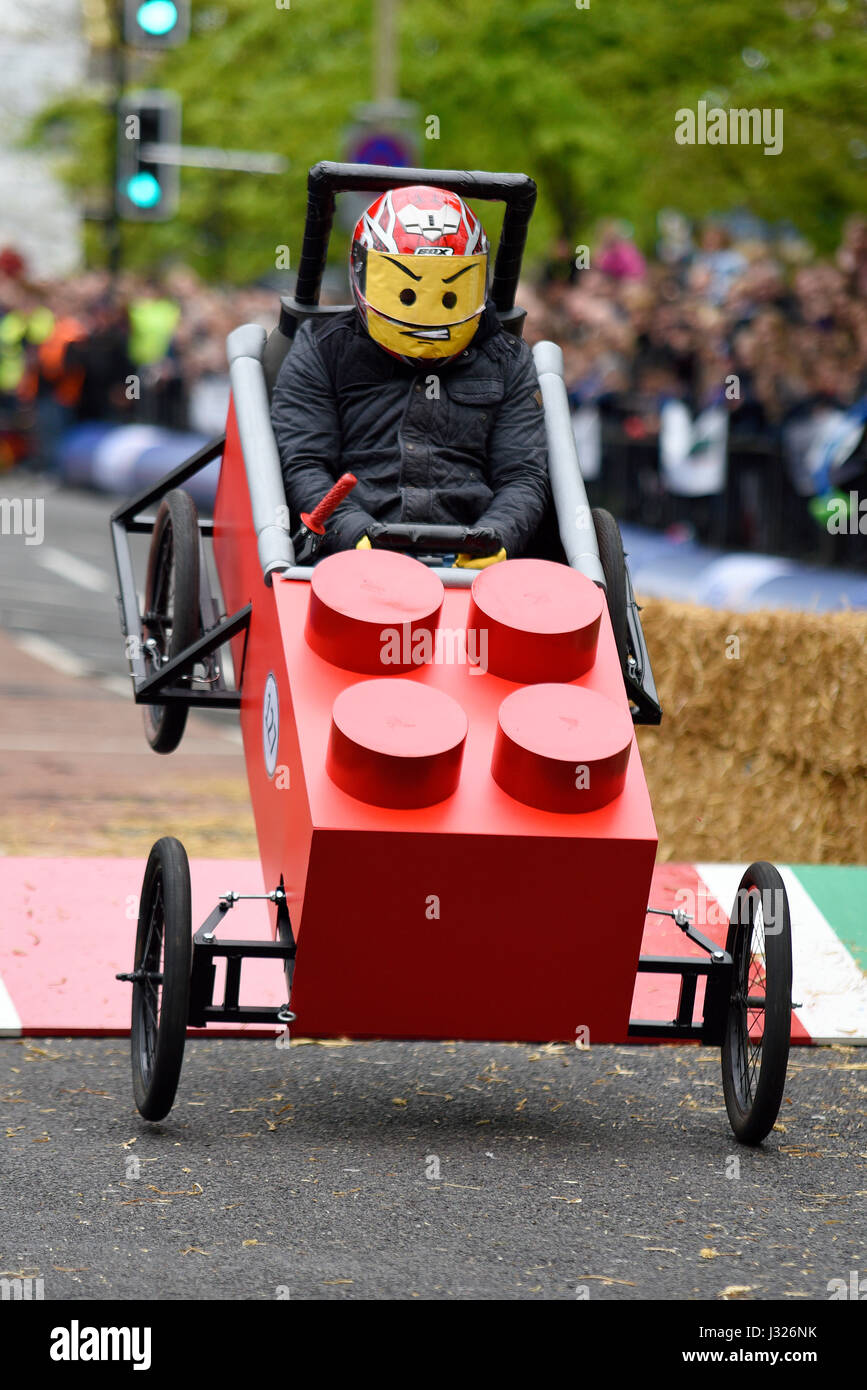 Soapbox, or soap box, derby carts leap over the jump ramps during an event in Billericay, Essex, UK. Home made race vehicles Stock Photo