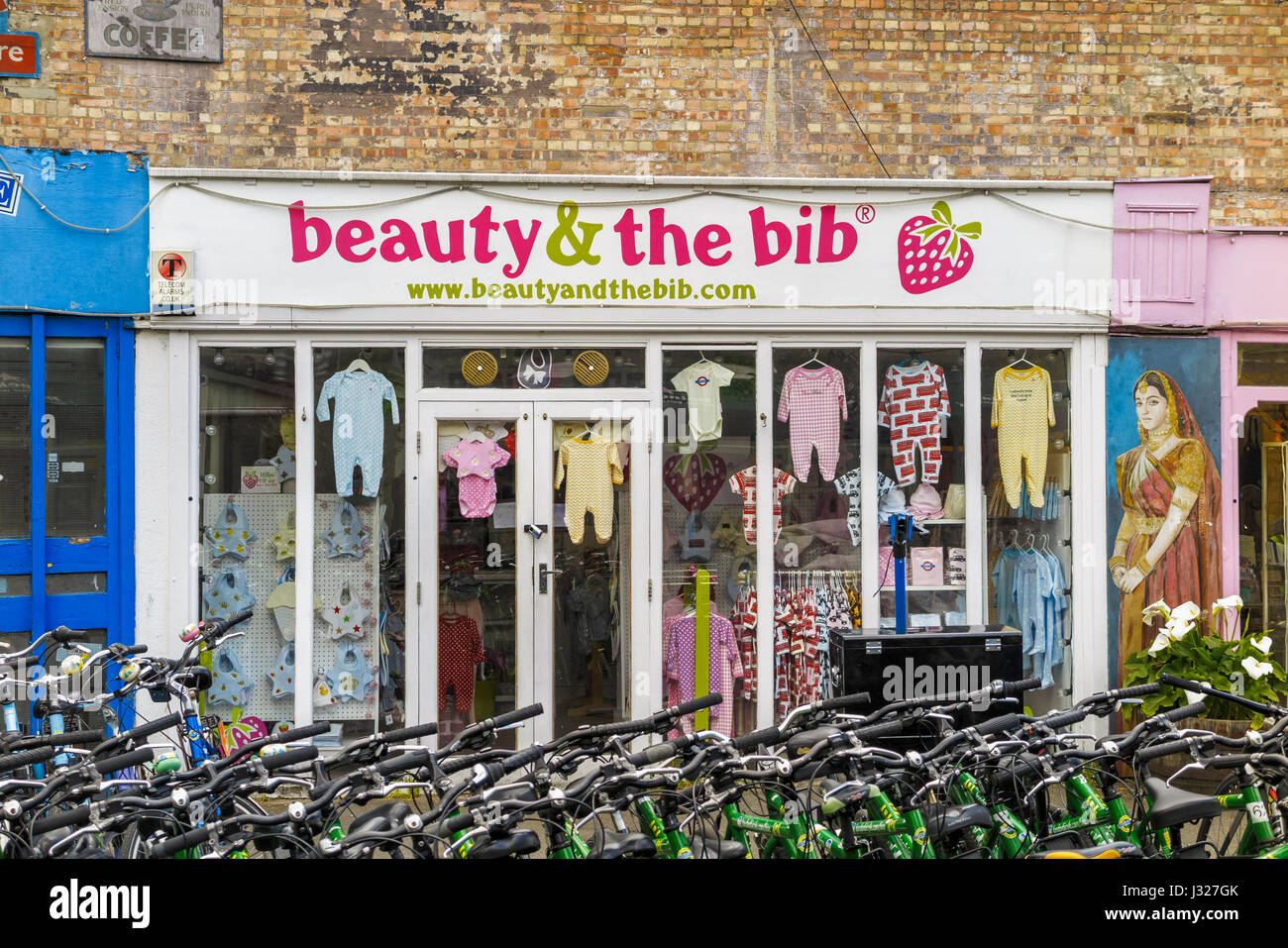 Shop front of baby clothes Beauty & the Bib, Wharf, South Bank, Upper Ground, London SE1, a well-known popular riverside marketplace Stock Photo - Alamy