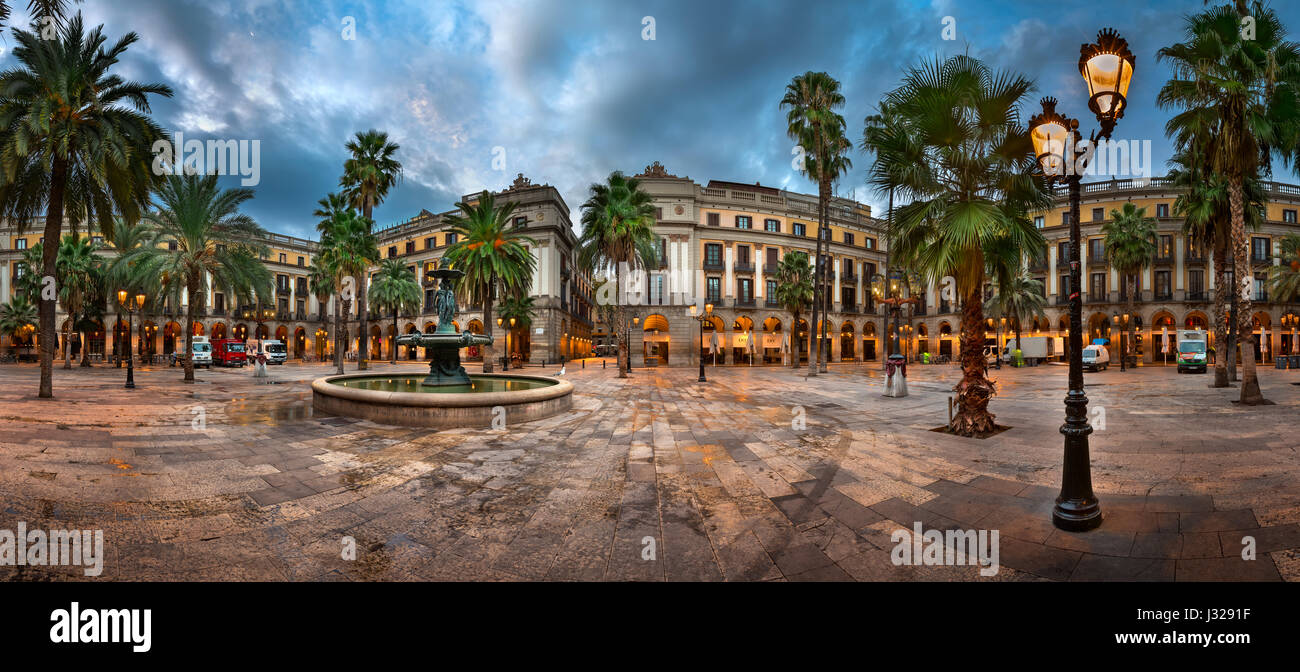 BARCELONA, SPAIN - NOVEMBER 17, 2014: Placa Reial in Barcelona, Spain. The square, with lanterns designed by Gaudi and the Fountain of Three Graces in Stock Photo