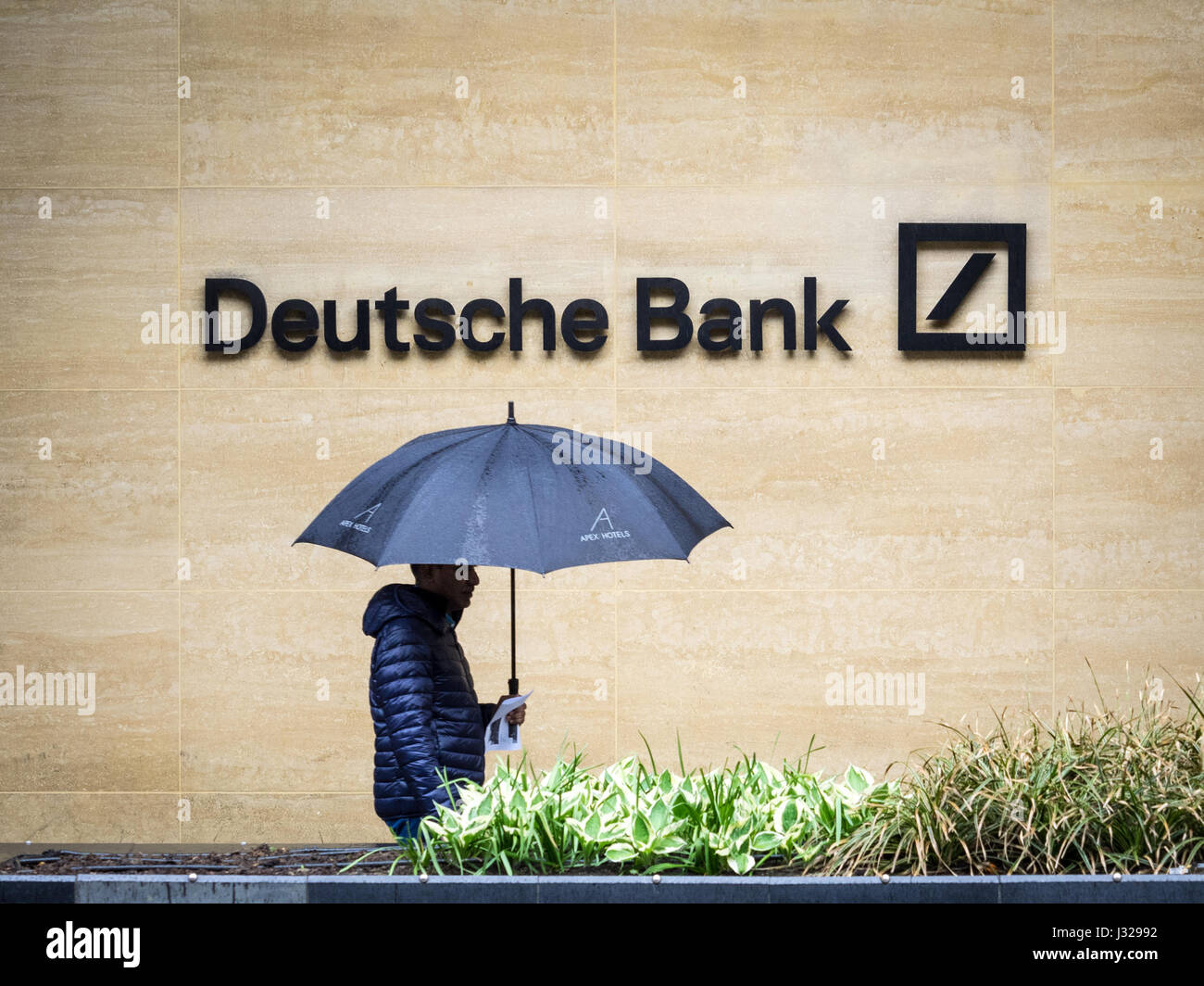 Deutsch Bank London A Man Walks Past The London Offices Of