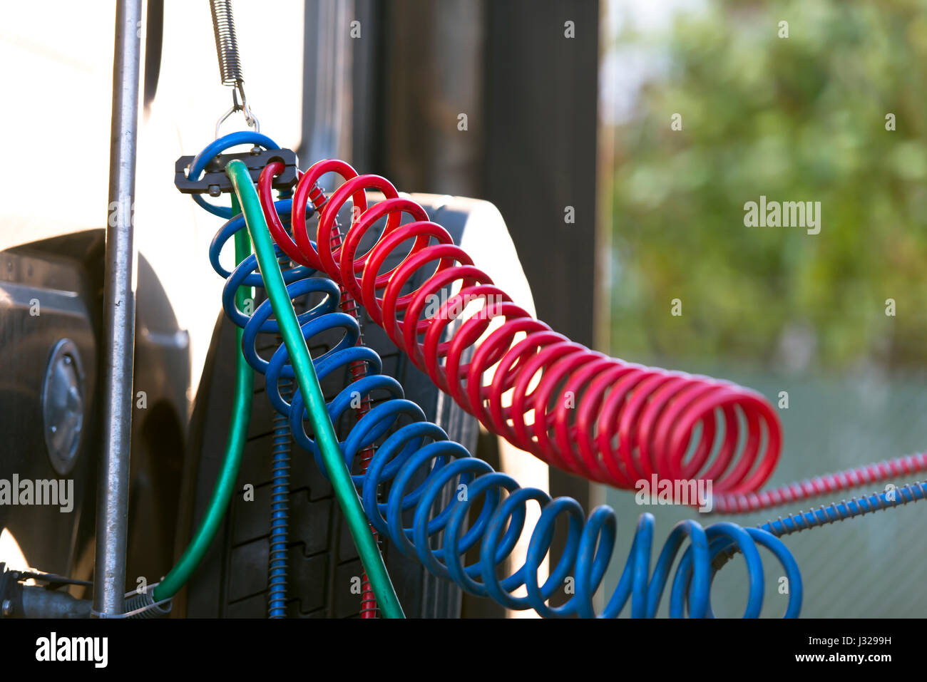 Bracket on the spring, which suspended the red, blue and green air