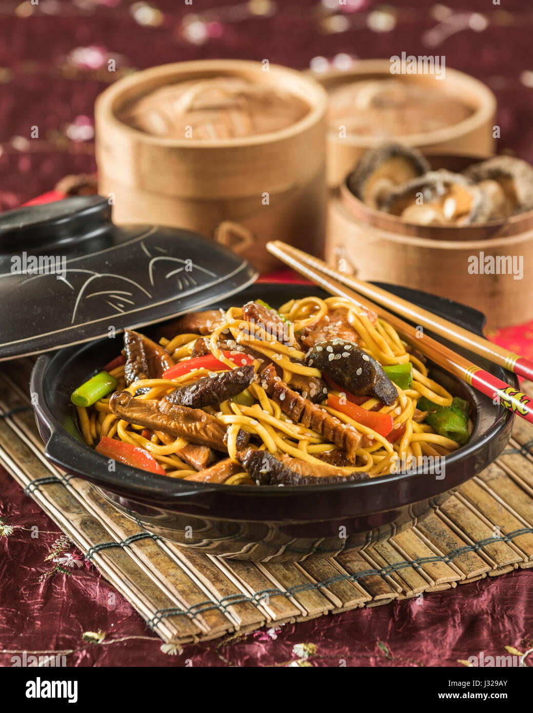 Hoisin duck noodles. Chinese food Stock Photo - Alamy